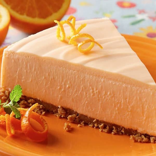 طرز تهیه چیز کیک پرتقالی یخچالی بدون ژلاتین